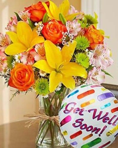 <p>Brighten their recovery with a burst of color and charm. The European Grandeur Get Well Bouquet delivers cheerful wishes and vibrant beauty, making it the perfect pick-me-up for someone on the mend. Designed to lift spirits and encourage healing, this bouquet is a heartfelt way to show you care.</p>
<p>Inspired by the countryside blooms of Europe, this lively arrangement features fresh roses, lilies, alstroemeria, poms, and other seasonal favorites. The flowers are hand-designed in a clear glass vase and tied with natural raffia, giving it a rustic, down-to-earth elegance. A coordinating 18-inch “Get Well” Mylar balloon adds a playful and uplifting finishing touch.</p>
<p>This bouquet is ideal for hospital deliveries, home recoveries, or simply to say “thinking of you” in the most colorful way possible. Its bright tones and joyful design provide comfort and positivity—making it a thoughtful gift for any healing journey.</p>
<p>Each European Grandeur Get Well Bouquet is crafted with care by expert florists. Same-day flower delivery is available throughout local communities, ensuring your gesture arrives fresh, full of color, and ready to brighten their day.</p>
<p>Add a personal message at checkout to send warm words alongside your gift. With every petal and pop of color, this bouquet says “feel better soon” in the most beautiful way.</p>