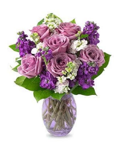 <p>Celebrate love, admiration, or a moment that simply matters with a bouquet as radiant as your feelings. This elegant arrangement is an expression of beauty and affection, filled with rich color and graceful charm.</p>
<p>The bouquet features lovely lavender roses, soft lavender stock, and vibrant pink stock, accented with an assortment of lush greenery for depth and texture. Hand-arranged in a classic glass vase, the design blends softness and sophistication in every bloom—creating a truly memorable presentation.</p>
<p>Perfect for anniversaries, birthdays, or just because, this bouquet symbolizes enchantment, gratitude, and heartfelt connection. Its soothing tones and fresh fragrance make it a thoughtful gift for anyone you hold dear.</p>
<p>Every arrangement is handcrafted by expert florists. Same-day delivery is available to ensure your thoughtful gesture arrives fresh, full, and beautifully styled.</p>
<p>Add a personalized message at checkout to make your gift even more meaningful. With this bouquet, you’re sending more than flowers—you’re sending a feeling.</p>