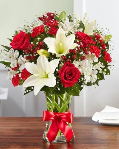 <p>Capture the feeling of pure bliss with a bouquet inspired by the peaceful beauty of the European countryside. The Fields of Europe Bliss Bouquet combines radiant blooms and lush textures to create a heartfelt gift that delights the senses and uplifts the spirit—perfect for any occasion.</p>
<p>This elegant arrangement features vibrant roses and soft, fragrant lilies, artfully gathered in a clear glass vase tied with a classic red ribbon. The harmonious blend of colors and textures brings warmth and charm, making it a beautiful way to express affection, appreciation, or joyful celebration.</p>
<p>Ideal for birthdays, milestones, or simply brightening someone’s day, this bouquet offers timeless appeal and cheerful energy. Its balanced design and lush blooms make it a meaningful gift for loved ones near or far.</p>
<p>Each bouquet is handcrafted by skilled local florists using the freshest flowers available. Some blooms may arrive in bud form to ensure longer-lasting enjoyment. Local delivery is available, ensuring your gift arrives fresh, fragrant, and full of beauty.</p>
<p>Send the Fields of Europe Bliss Bouquet to share a moment of happiness, grace, and lasting charm.</p>