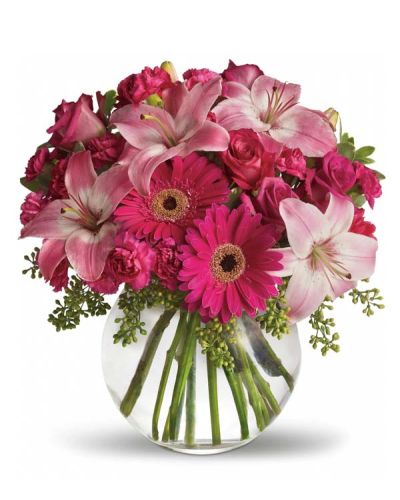 <p>Looking for a gift that radiates charm and joy? The Tickled Pink Bouquet is the perfect choice to brighten someone’s day with beauty, color, and heartfelt emotion. It’s a youthful, graceful arrangement designed to leave a lasting impression.</p>
<p>This cheerful bouquet features soft pink roses, elegant Asiatic lilies, bold hot pink Gerbera daisies, miniature carnations, and full-sized pink carnations. Hand-arranged in a stylish clear glass ball vase, the blooms are lush, vibrant, and bursting with personality—just like the lucky recipient.</p>
<p>Perfect for anniversaries, birthdays, congratulations, or “just because” moments, the Tickled Pink Bouquet celebrates femininity, joy, and affection. Its pink palette symbolizes love, admiration, and playfulness, making it a thoughtful gift for anyone you hold dear.</p>
<p>Every arrangement is carefully handcrafted by expert florists with attention to detail. Same-day delivery is available throughout local communities, ensuring your bouquet arrives fresh, radiant, and full of joy.</p>
<p>Add a sweet personal message at checkout to make your gift even more special. With the Tickled Pink Bouquet, you’re not just sending flowers—you’re sending a little happiness in bloom.</p>
