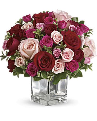 <p>Love doesn’t always need words. This stunning bouquet captures the full spectrum of romance in a vibrant arrangement that feels like a heartfelt melody—delicate, passionate, and unforgettable.</p>
<p>Featuring a harmonious mix of red, pink, and purple roses, each bloom is chosen to represent a different facet of love. Red roses convey deep passion, pink expresses admiration and sweetness, and purple adds a touch of mystery and enchantment. Accented with fresh greenery and arranged in a classic clear vase, this bouquet is both elegant and emotionally rich.</p>
<p>Perfect for anniversaries, Valentine’s Day, or spontaneous romantic gestures, this arrangement is designed to make a lasting impression. Whether you’re celebrating a special milestone or simply want to say “I love you,” it delivers your message with timeless beauty.</p>
<p>Handcrafted with care by a trusted florist, each bouquet is delivered fresh and full of feeling. While rose colors and accents may vary slightly with seasonal availability, the romantic medley remains true to its heartfelt design.</p>
<p>Let this bouquet do the talking with a display that sings of affection, devotion, and lasting connection.</p>
