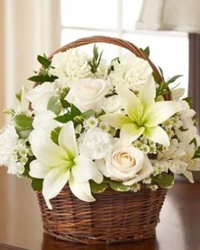 <p>Sometimes the most powerful expressions of sympathy are the simplest. The Peace, Love & Hope Basket in white offers a pure and elegant tribute that speaks from the heart. With its all-white design and graceful presentation, this arrangement conveys peace, love, and heartfelt remembrance in the most respectful way.</p>
<p>Handcrafted with care, this serene basket includes pristine white roses, lilies, alstroemeria, carnations, mini carnations, and monte casino. Accented with soft variegated pittosporum and gathered in a natural willow handled basket, it creates a gentle and comforting presence—perfect for honoring a loved one or offering support to grieving family and friends.</p>
<p>White blooms symbolize reverence, innocence, and serenity, making this design ideal for expressing sympathy. Suitable for delivery to the home or memorial service, this timeless arrangement offers both comfort and quiet strength when it is needed most.</p>
<p>Each basket is arranged by experienced florists with attention to detail and care. Same-day flower delivery is available throughout local areas, ensuring your gesture arrives fresh, beautiful, and thoughtfully presented.</p>
<p>Adding a personal message at checkout allows you to share your condolences and show you care. This meaningful arrangement provides a graceful reminder of your love, compassion, and support during life’s most difficult moments.</p>