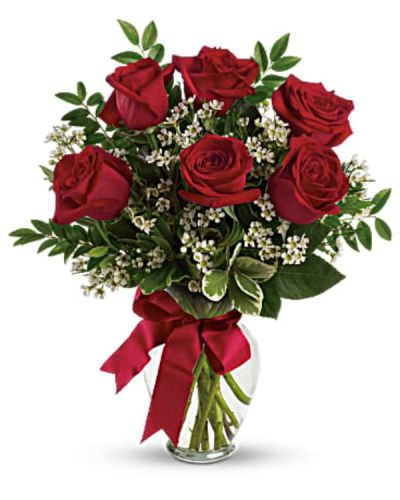 <p>Brighten her day with an unexpected gesture of love. This sweet and simple bouquet proves the most meaningful gifts often come without a special occasion. Whether to say “I’m thinking of you” or just to make her smile, it’s a heartfelt way to show you care.</p>
<p>The bouquet features striking red roses paired with delicate white waxflower and accented by fresh huckleberry and pittosporum. A classic clear glass vase and bold red satin ribbon complete the look, giving the arrangement a polished yet romantic feel. Available in sizes with 3, 6, or 9 stunning red roses—each selected for deep color and beauty.</p>
<p>Perfect for anniversaries, romantic gestures, or unexpected “just because” moments, this bouquet brings warmth and love straight to her doorstep. Its timeless red and white combination makes it an elegant and passionate gift she’ll always remember.</p>
<p>Handcrafted by expert florists, each bouquet is arranged with care and attention to detail. Same-day flower delivery is available locally, ensuring freshness and thoughtful presentation.</p>
<p>Add a personal note during checkout to make your gift even more special. With this bouquet, a simple delivery becomes a meaningful moment. Order now to give the gift of love—delivered beautifully every time.</p>