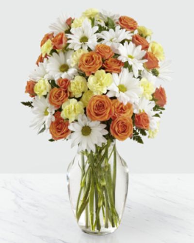 <p>Celebrate life’s cheerful moments with this vibrant bouquet bursting with color, energy, and joy. Designed to bring a smile to any occasion, it combines bold hues with classic blooms in a way that feels refreshing and unforgettable. Whether sending birthday wishes, congratulations, or a sunny surprise, this bouquet delivers your message with warmth and style.</p>
<p>The arrangement features crisp white daisies as a soft, cheerful backdrop for vivid orange spray roses and bright yellow mini carnations. The contrast of colors creates a citrus-inspired look that feels fresh and full of personality. Each stem is carefully selected and hand-arranged for balance, fullness, and beauty, resulting in a bouquet pleasing to both eye and heart.</p>
<p>Perfect for birthdays, get well wishes, thank-you gifts, or everyday celebrations, this bouquet suits a wide range of occasions. Its uplifting color palette brings joy to any room, making it a thoughtful choice for friends, family, coworkers, or anyone who could use a burst of brightness.</p>
<p>Handcrafted by expert florists, each bouquet is made fresh to order and delivered by hand. Same-day flower delivery is available locally. Ordering supports a local business that values quality, care, and personal service.</p>
<p>Add a heartfelt message during checkout to personalize your gift. Whether near or far, this bouquet helps you send sunshine in floral form. Order today for same-day delivery and share the joy with someone who deserves something bright and beautiful.</p>
