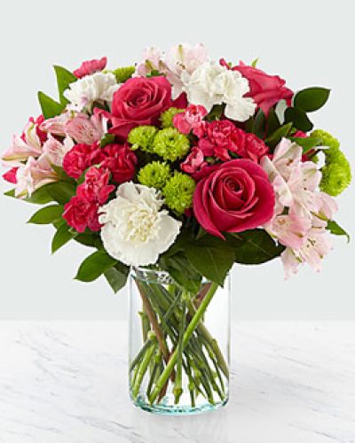 <p>Few gestures are as uplifting as a surprise bouquet, and this arrangement delivers joy with every petal. It offers a tender expression of affection, designed to brighten someone’s day with soft charm and cheerful colors. It’s a beautiful way to say “thinking of you,” “you’re appreciated,” or “just because.”</p>
<p>The bouquet features a harmonious blend of hot pink roses, pale pink alstroemeria, and seasonal accent flowers. Presented in a simple yet elegant glass cylinder vase, the design balances sophistication with playfulness. The contrast of bold and blush tones brings vibrant yet graceful color to any space, making it ideal for desks, dining tables, or bedside stands.</p>
<p>Perfect for birthdays, get well wishes, or celebrating milestones big and small, this bouquet leaves a lasting impression. Its soft fragrance and delicate arrangement speak from the heart, sending warmth and affection without many words. Whether surprising a friend, honoring a loved one, or adding beauty to your own day, it uplifts and inspires.</p>
<p>Each bouquet is arranged with care by expert florists and available for same-day delivery in the local area. Blooms arrive fresh and full of life, hand-delivered with care and thoughtfulness.</p>
<p>Let someone know they’re on your mind with this graceful burst of color and kindness. It’s the perfect way to make ordinary days special and remind someone how much they mean to you.</p>