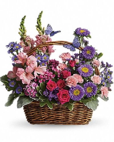 <p>Delight someone special with a vibrant bouquet that captures the beauty of a blooming garden. This charming basket arrangement is a bountiful celebration of color, texture, and natural charm—perfect for bringing joy and warmth to any occasion.</p>
<p>The wicker basket overflows with fresh flowers, including hot pink spray roses, light pink alstroemeria, snapdragons, miniature carnations, dark pink Sweet William, purple Matsumoto asters, large Monte Casino asters, statice, and pittosporum. The lush mix of blossoms and greenery creates a picnic-inspired display full of life and whimsy.</p>
<p>Ideal for birthdays, thank-you gifts, housewarmings, or simply brightening someone’s day, this basket is a thoughtful and festive way to show you care. The vivid colors and delicate details, like two pretty butterflies nestled among the flowers, add an extra touch of magic.</p>
<p>Each arrangement is handcrafted by skilled florists who ensure it arrives fresh and beautifully arranged. Same-day delivery is available to provide prompt and thoughtful service.</p>
<p>Add a personal message to make your gift even more meaningful. This basket sends more than flowers—it shares a joyful expression of nature’s beauty and heartfelt thoughtfulness.</p>
