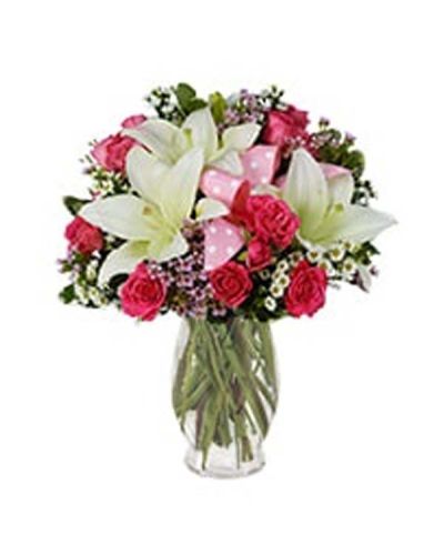 <p>Welcome a precious new arrival with flowers as sweet and delicate as she is. The Beautiful Baby Bouquet in pink is a joyful celebration of life, crafted to honor a beautiful beginning and bring smiles to proud parents and loved ones alike.</p>
<p>This charming arrangement features soft pink roses, pink waxflower, white Asiatic lilies, and white Monte Casino blooms. Designed in a pink fluted glass vase and accented with a playful pink polka dot ribbon, the bouquet feels fresh, festive, and full of heartwarming detail—just right for welcoming a baby girl.</p>
<p>Perfect for hospital deliveries, baby showers, or homecoming gifts, this bouquet sends warm congratulations and pure delight. The gentle pink and white tones represent innocence, new life, and unconditional love, making this gift both meaningful and adorable.</p>
<p>Each Beautiful Baby Bouquet in pink is handcrafted with care by expert florists. Same-day flower delivery is available throughout local communities, ensuring your thoughtful gift arrives fresh, fragrant, and perfectly timed for the occasion.</p>
<p>Include a congratulatory message at checkout to make your gift even more special. Let local experts help you celebrate new beginnings with beauty, warmth, and care.</p>