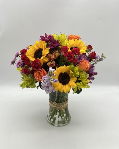 <p>Celebrate their special day with a bouquet as stunning as they are. The Birthday Beauty Bouquet captures the joy and warmth of a birthday celebration, making every moment feel brighter and more memorable. It’s a radiant way to show you care and create a truly unforgettable day.</p>
<p>This cheerful arrangement features bold sunflowers and classic roses, complemented by a mix of fresh seasonal blooms and lush greenery. Expertly arranged in a clear glass vase, the bouquet offers timeless appeal. The vibrant blend of golden yellows and soft reds creates a sunny, joyful display full of charm and life.</p>
<p>Perfect for birthdays or any happy occasion, the Birthday Beauty Bouquet brings warmth, energy, and celebration into any space. Each bloom is a heartfelt expression of love, joy, and best wishes.</p>
<p>Handcrafted by skilled local florists using the freshest flowers available, some blooms may arrive in bud form to ensure extended beauty. Local delivery is available, ensuring your thoughtful gift arrives fresh and ready to brighten their day.</p>
<p>Send the Birthday Beauty Bouquet today to celebrate life, love, and the joy of another year.</p>