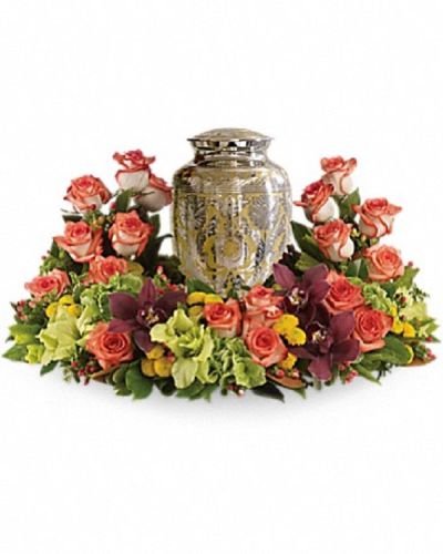 <p>Offer a heartfelt tribute that gently embraces cherished memories with grace and warmth. This beautiful arrangement expresses sympathy with subtle richness and thoughtful elegance.</p>
<p>The oval-shaped garden features a harmonious blend of orange roses combined with cymbidium orchids, gladioli, chrysanthemums, hypericum, and delicate greenery. The warm hues evoke the serene beauty of a sunset, creating a comforting and reflective presence at any memorial or funeral service.</p>
<p>Ideal for those seeking to convey deep sympathy with a gentle touch, this arrangement speaks of remembrance, hope, and lasting affection. Please note this arrangement does not include an urn and is intended as a standalone floral tribute.</p>
<p>Each arrangement is handcrafted by expert florists who ensure it arrives fresh and respectfully arranged. Same-day delivery is available to provide timely and compassionate service.</p>
<p>Add a personal message to accompany this beautiful expression of care. This tribute sends more than flowers—it sends a lasting symbol of love and remembrance.</p>