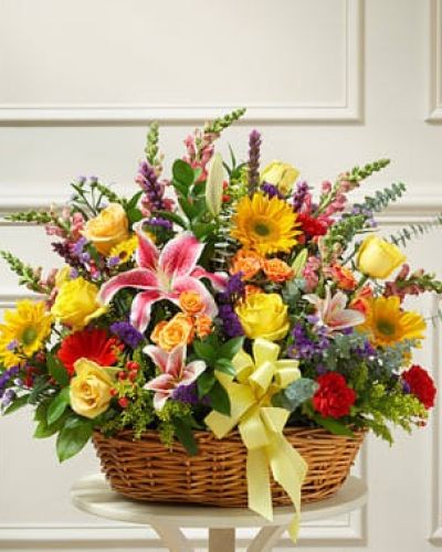 <p>Even in the darkest of times, a burst of color can offer hope. The Bright Blessings Sympathy Arrangement in Basket delivers warmth, comfort, and a message of resilience through every petal. This radiant display offers a heartfelt way to honor someone special while letting loved ones know they are not alone in their grief.</p>
<p>Overflowing with vibrant beauty, this sympathy arrangement includes a generous mix of sunflowers, Gerbera daisies, orange spray roses, lilies, carnations, and other fresh seasonal blooms. Each flower is selected for its symbolic meaning—sunflowers for loyalty and longevity, lilies for peace, and roses for love and remembrance. The entire bouquet is thoughtfully hand-arranged in a natural willow basket, offering rustic charm and ease of placement in the home or at a memorial service.</p>
<p>Perfect for sending to funeral homes, celebrations of life, or directly to a grieving family’s doorstep, this arrangement balances sympathy with brightness. It honors the life of the departed while offering encouragement to those left behind. Whether expressing condolences from a distance or showing support in person, this display is both uplifting and dignified.</p>
<p>Lovingly prepared and delivered by trusted local florists, the Bright Blessings Sympathy Arrangement in Basket is available for same-day delivery when in stock. Every bouquet is crafted with fresh, high-quality flowers and personal attention. The team ensures your gesture of support arrives beautifully and punctually—whether across town or just around the corner.</p>
<p>Add a custom message at checkout to share your heartfelt condolences and remind recipients that brighter days will come. The Bright Blessings Sympathy Arrangement in Basket stands as a tribute to life, love, and lasting memory.</p>