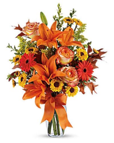 <p>Celebrate the splendor of the season with a rich and radiant bouquet that captures the beauty of fall in full bloom. Designed to bring warmth and color into any space, this eye-catching arrangement overflows with vibrant hues and textures that evoke the feeling of a perfect autumn day. Whether sending thanks, love, or simply celebrating the changing season, this bouquet delivers joy with every petal.</p>
<p>This arrangement features a curated mix of seasonal flowers in rich shades of orange, golden yellow, and deep red. It includes a lush blend of autumn favorites like roses, alstroemeria, daisy chrysanthemums, and more, expertly accented with fresh greenery and textural elements for added depth. Every stem is hand-selected and thoughtfully arranged in a classic glass vase, creating a warm and elegant presentation that instantly transforms any room.</p>
<p>Perfect for Thanksgiving, birthdays, hostess gifts, or seasonal décor, this bouquet makes a meaningful gesture during fall’s most memorable moments. Its radiant color palette and full-bodied design embody gratitude, abundance, and natural beauty—making it an ideal gift to share appreciation or brighten a home.</p>
<p>Each bouquet is carefully handcrafted with attention to detail and made fresh to order. Same-day delivery is available locally, with every arrangement hand-delivered with care—no shipping boxes or assembly required.</p>
<p>You can add a personal message at checkout to make your gift even more heartfelt. Whether near or far, this bouquet brings the warmth of the season straight to their door—fresh, elegant, and unforgettable.</p>
