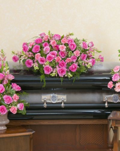<p>Offer a gentle farewell filled with grace, love, and quiet beauty. This soft and elegant floral tribute is designed to bring comfort and honor a cherished life with the serene warmth of peaceful pink blooms.</p>
<p>This coordinated set includes a delicate casket spray, a standing spray, and an urn arrangement, all designed in soft shades of pink. Featuring roses, lilies, carnations, and other seasonal flowers, each piece is lovingly crafted to create a cohesive and comforting presence during the service.</p>
<p>Ideal for family members or close friends looking to express deep admiration and affection, this trio symbolizes healing, remembrance, and eternal love. Its calming palette offers a beautiful way to celebrate a life that touched many hearts.</p>
<p>Each arrangement is handcrafted with care by skilled florists. Same-day delivery is available to funeral homes and memorial venues throughout the local area, ensuring every piece arrives fresh and thoughtfully prepared.</p>
<p>Include a heartfelt message at checkout to personalize your tribute. Honor a beautiful soul with floral expressions as tender and timeless as the memories they leave behind.</p>