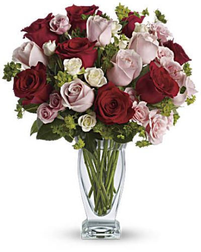 <p>Romance takes center stage with a bouquet that speaks straight from the heart. Bold yet graceful, this arrangement is a striking way to express love, admiration, or affection—perfect for any moment when words aren’t enough.</p>
<p>A rich blend of red, pink, and white roses creates a stunning harmony of color and meaning. Deep red roses signify passion, soft pinks evoke tenderness, and delicate white spray roses add a layer of purity and sweetness. Accented with fresh greenery and arranged in a sleek clear vase, the bouquet balances elegance with emotional depth.</p>
<p>Ideal for Valentine’s Day, anniversaries, birthdays, or heartfelt surprises, this bouquet makes a lasting impression. Whether it’s a grand romantic gesture or a quiet expression of love, it offers timeless appeal with a modern twist.</p>
<p>Each arrangement is handcrafted by a local florist and delivered fresh and ready to impress. While rose shades may vary slightly due to seasonal availability, the romantic beauty of the design remains faithful to its spirit.</p>
<p>Let your feelings bloom with a bouquet that brings passion and elegance together—thoughtfully designed and beautifully delivered.</p>