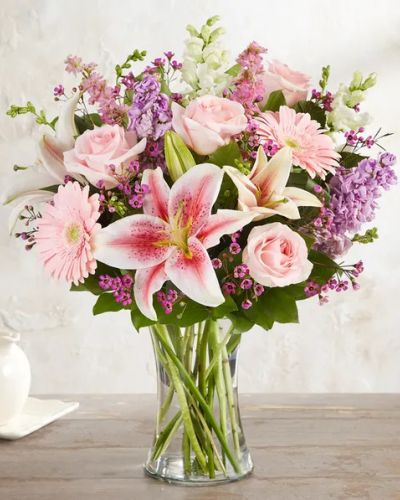 <p>Let her know she’s always in your thoughts with a bouquet that speaks the language of love through soft pinks and gentle lavenders. The Always On My Mind Bouquet is a romantic, garden-inspired arrangement thoughtfully hand-gathered to express lasting beauty and heartfelt sentiment.</p>
<p>This elegant design features a lush mix of pink and purple blooms, carefully selected to convey warmth, affection, and grace. Each flower is artfully arranged to create a timeless display that lingers in memory long after the blooms have faded.</p>
<p>Perfect for anniversaries, birthdays, or simply to share your heartfelt emotions, this bouquet offers a classic yet modern expression of love. Its soft colors and flowing form create a design that feels both romantic and refined.</p>
<p>Each arrangement is handcrafted by experienced local florists using the freshest flowers available. Some blooms may arrive in bud form to extend the beauty over several days. Local delivery is available, ensuring your gift arrives fresh, fragrant, and full of love.</p>
<p>Send the Always On My Mind Bouquet to brighten her day and let her know just how much she means to you.</p>