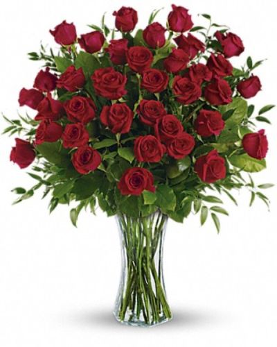 <p>Make an unforgettable statement with this awe-inspiring bouquet of three dozen premium red roses arranged to perfection. Bold, elegant, and overflowing with passion, this is the ultimate floral gesture of love and devotion.</p>
<p>This impressive arrangement features 36 rich red roses, each selected for its deep color, velvety petals, and flawless form. Accented with lush greenery and presented in a flared clear glass vase, the bouquet is both grand and graceful. It is the kind of gift that turns heads, melts hearts, and leaves a lasting impression.</p>
<p>This bouquet is the perfect choice for anniversaries, milestone celebrations, romantic surprises, or any time you want to show love in its most dramatic form. The sheer volume of roses combined with their timeless symbolism makes it a breathtaking tribute to your deepest feelings.</p>
<p>Each arrangement is handcrafted with care by expert florists to ensure freshness and beauty. Same-day delivery is available to ensure your gift arrives fresh and perfectly presented, with the attention to detail that only local artisans provide.</p>
<p>Add a heartfelt message during checkout to make this grand gesture even more personal. With this bouquet, you are not just sending roses—you are creating a memory they will treasure.</p>