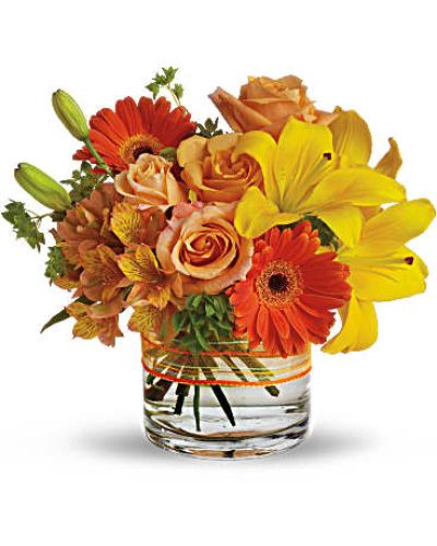 <p>Send a ray of sunshine with this warm and inviting bouquet that captures the essence of a relaxing summer afternoon. With golden hues and vibrant florals, this cheerful arrangement is perfect for lifting spirits, celebrating milestones, or simply bringing warmth to someone’s day.</p>
<p>The bouquet features a radiant mix of yellow Asiatic lilies, light orange roses, and a bold orange gerbera daisy. Delicate Peruvian lilies add detail and charm, while fresh bupleurum provides a pop of bright green for a refreshing finish. All blooms are hand-arranged in a modern low clear cylinder vase, wrapped with sheer organza ribbon for a polished look.</p>
<p>Ideal for birthdays, thank-you gifts, summer celebrations, or just because, this bouquet’s sunny palette and compact design fit well in home offices, kitchen tables, or reception areas. The clean lines of the vase paired with vibrant flowers create a sophisticated yet relaxed feel, perfect for anyone who loves a modern twist on classic beauty.</p>
<p>Each arrangement is handcrafted by skilled florists and available for same-day delivery locally. Every order is made fresh and delivered by hand with care—no boxes, no assembly, no shortcuts.</p>
<p>Add a personalized message during checkout to make your gift even more meaningful. Whether sending gratitude, love, or a moment of calm, this bouquet offers a fresh and stylish way to share joy.</p>
<p>Order now for same-day flower delivery and give someone a moment of sunshine wrapped in blooms.</p>